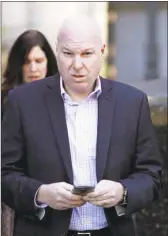  ?? Mark Lennihan / Associated Press ?? Former Adidas executive James Gatto arrives at federal court in New York on Oct. 18.