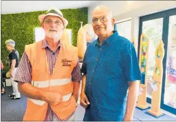  ??  ?? Otaki Pottery Club member Rod Graham, left, with Ka¯ piti mayor K Gurunathan.