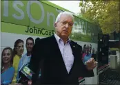  ?? RICH PEDRONCELL­I — THE ASSOCIATED PRESS FILE ?? Republican gubernator­ial candidate John Cox talks to reporters before beginning a statewide bus tour in Sacramento.