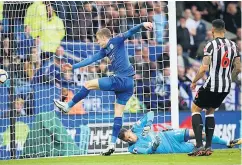  ??  ?? FOX IN THE BOX Jamie Vardy struck late for Leicester but it was in vain