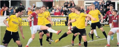  ?? Mike Roddy in action for Skelmersda­le United against South Shields and (left) danger in the penalty area and (below) Jack Fleming lies injured John Driscoll ??