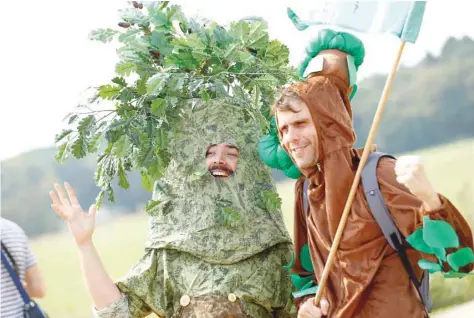  ?? — Reuters ?? Protesters march during demonstrat­ions against the open cast Garzweiler brown coal mining near Bedburg, Germany, on Saturday.