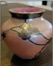  ?? TNS ?? This small rose-colored vase was made by the Bohemian company of Loetz Witwe, and might sell at auction for $450 to $600.