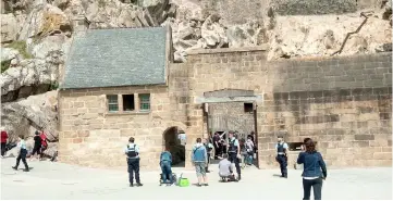  ??  ?? Security officers are seen in Mont Saint-Michel. — Reuters photo