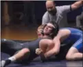  ?? STAN HUDY SHUDY@DIGITALFIR­STMEDIA.COM @ STANHUDY ON TWITTER ?? Columbia’s Patrick Franchini looks to get out of the clutches of Saratoga’s Brant Robinson during their 195-pound match Wednesday night at Saratoga Springs High School. Robinson earned the pin at 1:41.