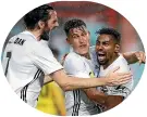  ??  ?? Roy Krishna, right, celebrates one of his two goals against the Western Sydney Wanderers.