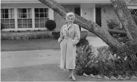  ?? ?? Marilyn Monroe poses outside her home during a photo call in 1956. Photograph: Gene Lester/Getty Images