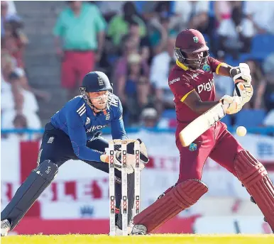  ??  ?? Jason Mohammed plays a shot during the first ODI match between West Indies and England at Sir Vivian Richards Cricket Ground, North Sound recently.