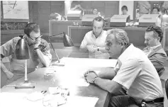  ?? — Courtesy of Focus Features ?? Marsan, second from left at end of table, stars as Peres and Ashkenazi, third from right in foreground, stars as Prime Minister Rabin.