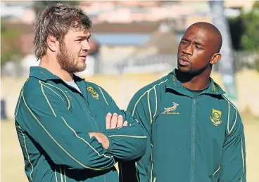  ?? /Gallo Images ?? We’ve come a long way: Duane Vermeulen, left, and Siya Kolisi at an SA Rugby Union symposium in Mthatha in July 2013.