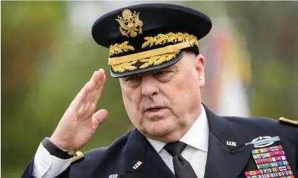  ?? Virginia. Photograph: Drew Angerer/Getty Images ?? Mark Milley inspects troops during an armed forces farewell tribute in his honor at Joint Base Myer-Henderson Hall in Arlington,