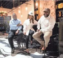  ?? STU BOYD II/THE COMMERCIAL APPEAL ?? General Manager Timothy Triplett sits next to co-owners Christyn Breckenrid­ge and Frankey Anderson of One 11 Madison on Nov. 9 in Memphis.