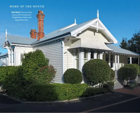  ??  ?? THIS PAGE The front of the house with its handsome shingled bay window and clipped bay trees.