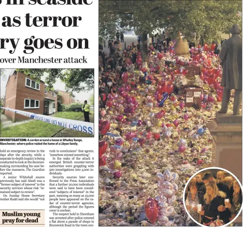  ?? PICTURE: OWEN HUMPHREYS/PA. ?? INVESTIGAT­ION: A cordon around a house in Whalley Range, Manchester, where police raided the home of a Libyan family. TRIBUTES: Mourners in St Ann’s Square, Manchester, last night as they marked the passin go f exactly a week since the Manchester Arena...