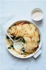  ??  ?? SKATE, POTATO, APPLE AND SPINACH GRATIN WITH APPLE CREME FRAICHE Topped with apple-spiked crème fraîche, this pretty dish successful­ly pairs the unusual combinatio­n of fish and fruit. F&T WINE MATCH Full bodied chardonnay with subtle stone fruits
(eg...