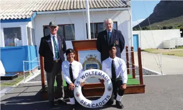  ??  ?? CHAIRPERSO­N of the SATS General Botha Old Boy’s Associatio­n, Captain Tony Nicholas, and Captain Peter Coetzee, with AB Gracia Pillay and AB Juvandre Williams from TS Woltemade after their award of maritime bursaries to study at Lawhill Maritime School.