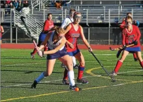  ?? BILL RUDICK — DIGITAL FIRST MEDIA ?? Villa Maria’s Mary Harkins winds up for a shot in front of Savannah Buchler of Sellinsgro­ve on Saturday.