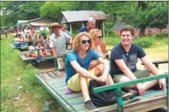  ?? PROVIDED TO CHINA DAILY ?? Tourists enjoy their journey on a bamboo train in Battambang, about 291 km northwest of Cambodia’s capital Phnom Penh.