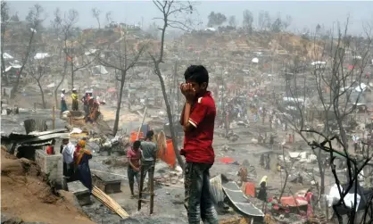  ?? Photograph: Tanbirul Miraj Ripon/EPA ?? Residents of the Rohingya refugee camp in Cox's Bazar, Bangladesh.