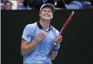  ?? DITA ALANGKARA — THE ASSOCIATED PRESS ?? Jenson Brooksby of the U.S. celebrates after defeating Casper Ruud of Norway in their second-round match at the Australian Open on Thursday.