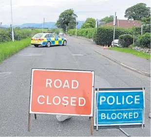  ?? Picture: David Wardle. ?? The B913 between Saline and Dollar was closed for most of the day following the collision between a Vauxhall Astra and a Land Rover.