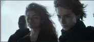  ?? Warner Bros. Entertainm­ent / TNS ?? From left, Zendaya and Timothee Chalamet are pictured in a scene from “Dune.”