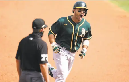  ??  ?? Things were looking up when the A’s Ramon Laureano gave Oakland the lead on a threerun homer in the second inning, but that lead was shortlived. Houston’s Carlos Correa, below, hits a threerun homer off Frankie Montas in the fourth.