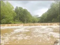  ?? (Courtesy Photo) ?? Above is the dam at full burst.