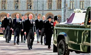  ??  ?? Britain’s Prince Charles, Prince of Wales (2R) and Princess Anne, Princess Royal, (R) lead the ceremonial funeral procession. (AFP)