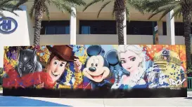  ?? Alex Saker / Contribute­d photo ?? ARCY's mural at the Disney D23 Expo in Anaheim, Calif., in 2019.