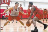  ?? Las Vegas Review-journal ?? Erik Verduzco
UNLV senior guard Luis Rodriguez, dribbling against Jordan Mccabe in practice, is looking to prove himself after transferri­ng from Ole Miss.