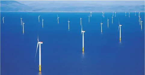  ?? REUTERS ?? This file photo shows the general view of the Walney Extension offshore wind farm operated by Orsted A/S off the coast of Blackpool, Britain.