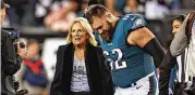  ?? RICH SCHULTZ / ASSOCIATED PRESS ?? First lady Jill Biden talks with Eagles center Jason Kelce before a game against the Cowboys on Oct. 16 in Philadelph­ia.