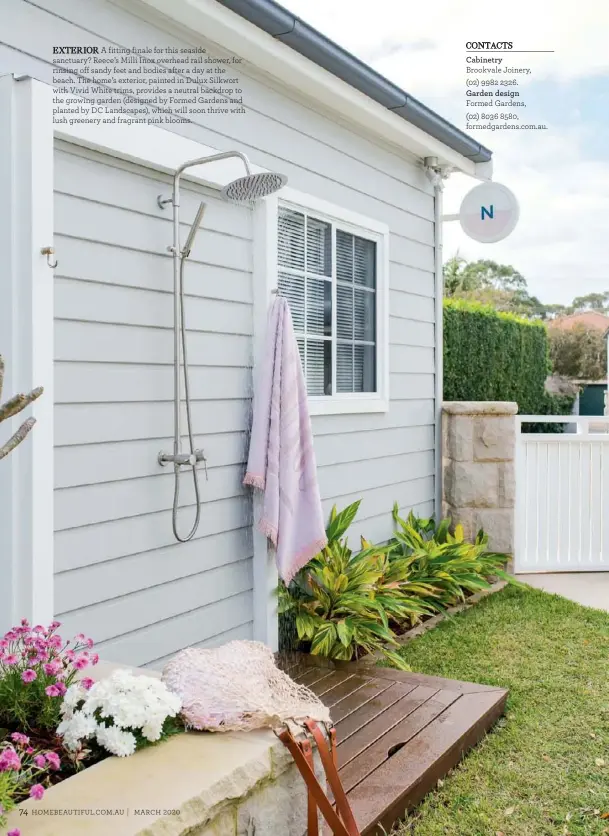  ??  ?? EXTERIOR A fitting finale for this seaside sanctuary? Reece’s Milli Inox overhead rail shower, for rinsing off sandy feet and bodies after a day at the beach. The home’s exterior, painted in Dulux Silkwort with Vivid White trims, provides a neutral backdrop to the growing garden (designed by Formed Gardens and planted by DC Landscapes), which will soon thrive with lush greenery and fragrant pink blooms.