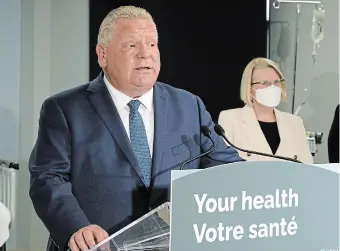 ?? FRANK GUNN THE CANADIAN PRESS FILE PHOTO ?? Premier Doug Ford and Health Minister Sylvia Jones discuss changes to health care. Gino DiCiocco argues their government cannot be trusted to make the right changes.