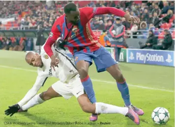  ?? — Reuters ?? CSKA Moscow’s Lacina Traore and Monaco’s Djibril Sidibe in action.