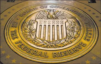  ?? Andrew Harnik The Associated Press ?? The Federal Reserve initiated an emergency lending program Sunday intended to shore up confidence in the financial system following the collapse of two large banks.