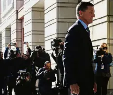  ?? — Reuters ?? Going in alone: Flynn arriving at the courthouse in Washington where he pleaded guilty to lying to the FBI about his contacts with Russia’s ambassador to the United States.