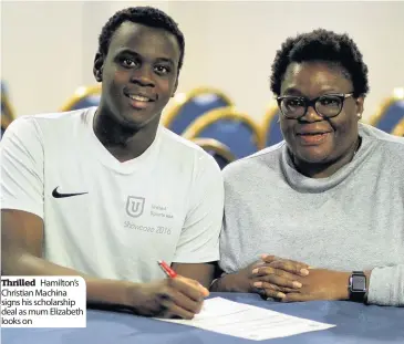  ??  ?? Thrilled Hamilton’s Christian Machina signs his scholarshi­p deal as mum Elizabeth looks on