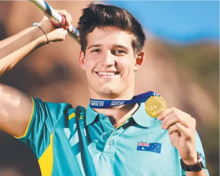  ?? Picture: ALIX SWEENEY ?? SKY’S THE LIMIT: Nash Lowis with his World Junior Championsh­ips javelin gold medal.