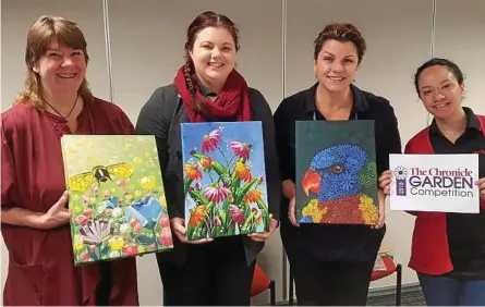  ?? Photo: Contribute­d ?? JUDGES: With the pleasurabl­e task of judging the winner in our cover art competitio­n are (from left) Roslyn Hartwig, holding the winning entry, Tennielle Copson, holding the second place entry, Anna Bartlett, holding the third place entry, and Jane Bray.