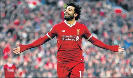  ?? Picture: GETTY IMAGES ?? EQUALS CLUB RECORD: Mohamed Salah of Liverpool celebrates scoring his side’s second goal during their Premier League match against West Ham United at Anfield on Saturday