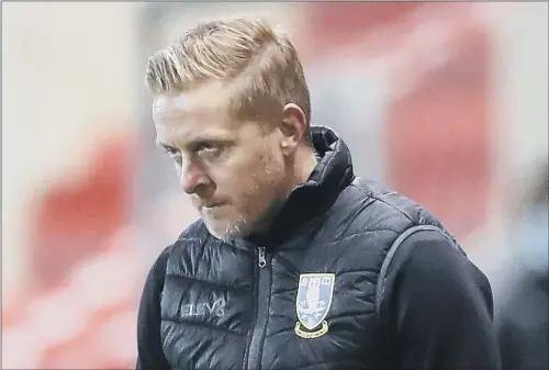  ?? PICTURE: DANNY LAWSON/ PA WIRE ?? TETCHY: Owls manager Garry Monk, perhaps understand­ably, is feeling the heat and was noticably tetchy in his post- Wycombe interview.