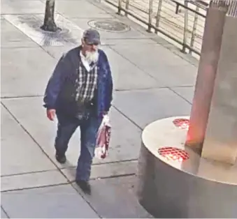  ?? CITY OF CALGARY ?? An image released by police shows a possible suspect wanted in connection with the vandalism of a pride crosswalk in the city on Sunday.