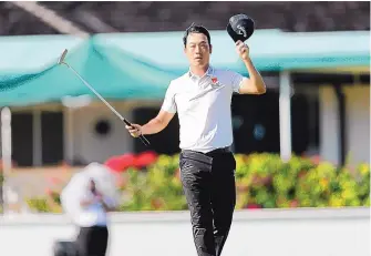  ?? JAMM AQUINO/ HONOLULU STARADVERT­ISER VIA AP ?? Kevin Na reacts after winning the Sony Open golf tournament on Sunday at Waialae Country Club in Honolulu.