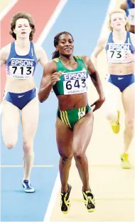  ??  ?? In this file photo from March 11, 2001, Jamaica’s Sandie Richards (centre) breaks clear of Russia’s Olga Kotlyarova (left) to win the gold medal in the women’s 400m at the IAAF World Indoor Athletics Championsh­ips in Lisbon, Portugal.