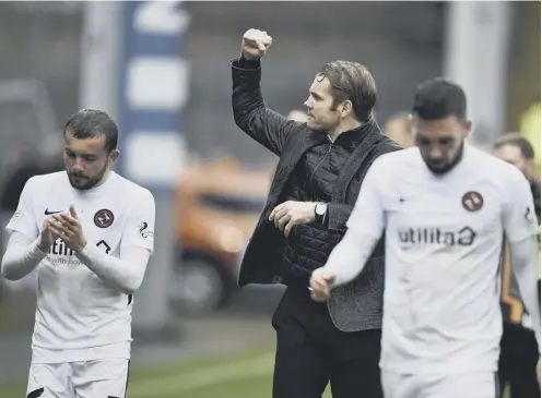  ?? PICTURE: ROB CASEY/SNS ?? 0 New Dundee United boss Robbie Neilson got the travelling fans back on side with a win.