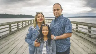  ?? ARLEN REDEKOP ?? West Vancouver residents Mozhgan Aghajanian, left, Omid Atayi and their daughter Armiti, 9, say they would like Farsi added to the school curriculum as an option for learning a second language.