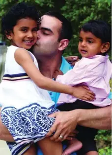  ?? ALVARO GOVEIA FOR THE TORONTO STAR ?? Sumit Madan, 32, hanging offline with Ameya, 4, and Kashyap, 1, has California on his radar for a perfect Father’s Day vacation.