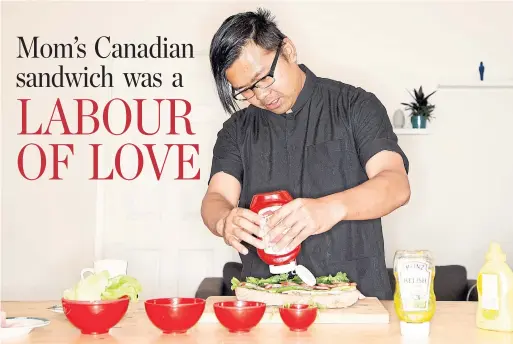  ?? CARLOS OSORIO TORONTO STAR/GETTY IMAGES ?? Immony Men, an assistant professor at OCAD University, making his mother’s version of a Canadian sandwich that involved a baguette, some pâté and ketchup.